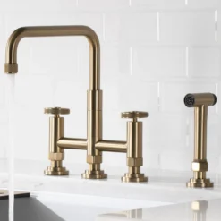 Industrial Bridge Kitchen Faucet with Side Sprayer in Brushed Gold