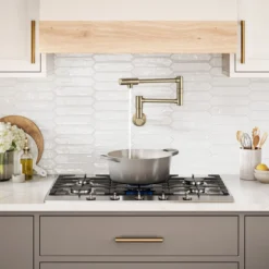 Wall Mount Pot Filler Kitchen Faucet with Retractable Arm in Spot-Free Antique Champagne Bronze