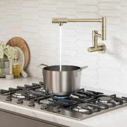 Wall Mount Pot Filler Kitchen Faucet with Retractable Arm in Spot-Free Antique Champagne Bronze